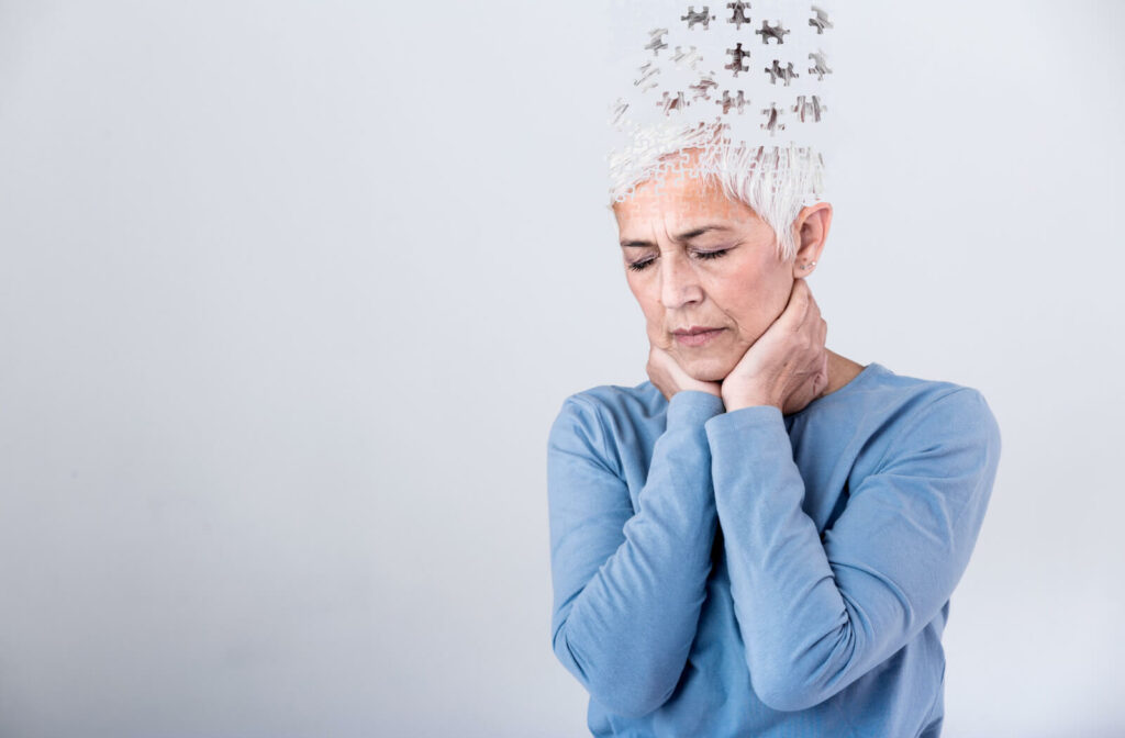 Senior woman's diminishing head parts symbolize declining cognitive function.