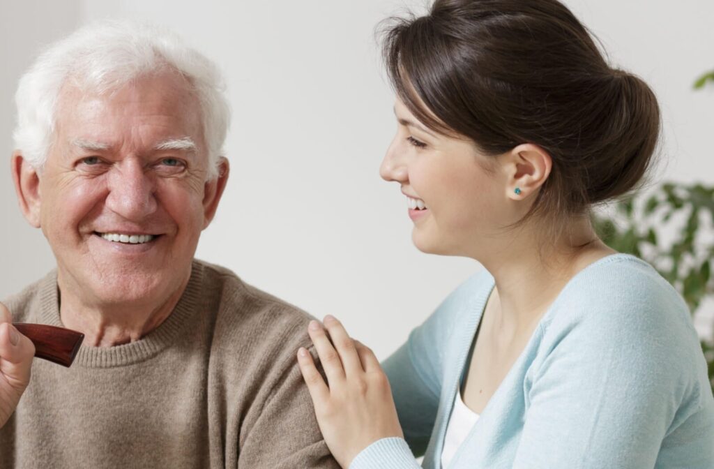A caregiver provides compassionate support to a senior.